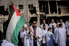 A view from the graduation ceremony held at Shifa Hospital in Gaza City, which suffered severe damage as a result of Israeli attacks, for 170 doctors who earned their specialist certificates from the Ministry of Health on December 25, 2025 under unprecedented hardship. A large number of Palestinians attended the ceremony, which was held in the hospital garden. [Saeed M. M. T. Jaras - Anadolu Agency]
