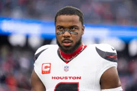 Azeez Al-Shaair #0 of the Houston Texans looks on prior to an NFC Divisional Playoff game against the New England Patriots at Gillette Stadium