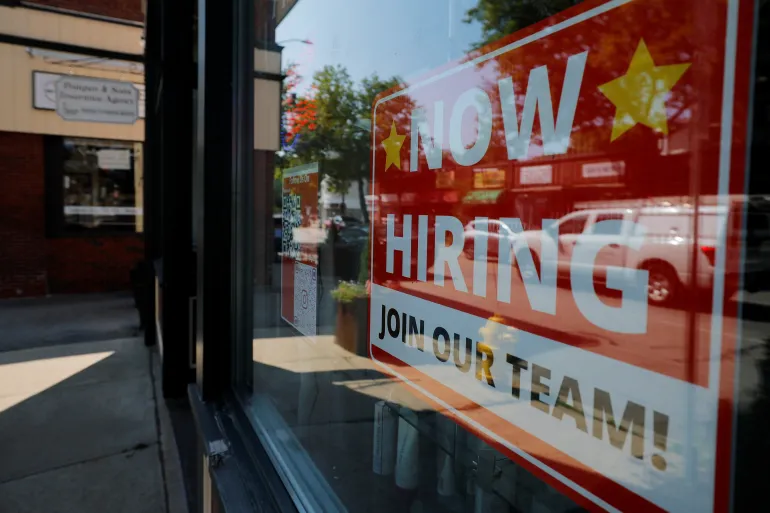 As layoffs surge job openings stall labour turnover stalls Americans who aren't making enough to meet their cost of living&nbsp;struggle&nbsp;to find new or additional work [File:&nbsp;Brian Snyder/Reuters]