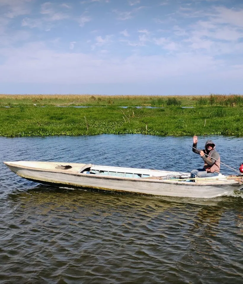 Man on boat in Lake Manzala