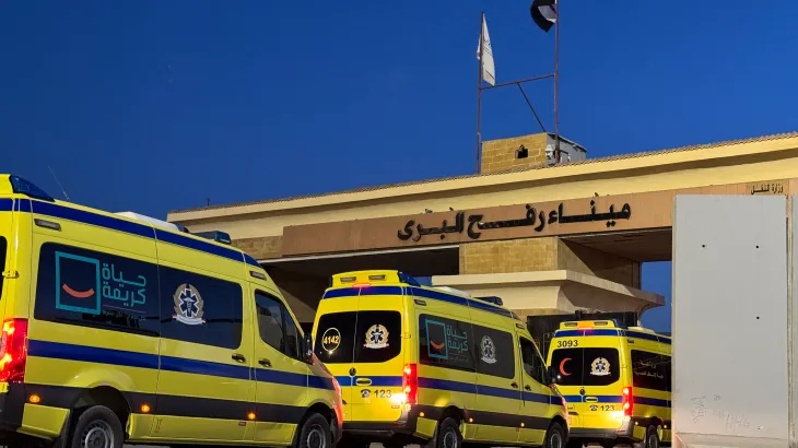 TOPSHOT - Ambulances wait in line at the Egyptian side of the Rafah border crossing with the Palestinian Gaza Strip, in northeastern Egypt on the first day of the evacuation of some 50 Palestinian, at the Rafah crossing on February 2, 2026.